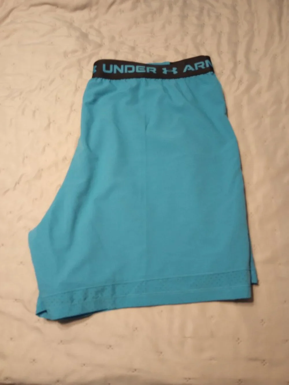 Under Armour blue athletic shorts (NWOT)
